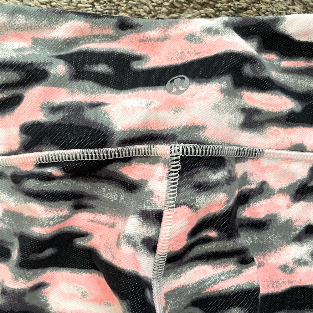 Lululemon pink camo colored capri leggings, size 6